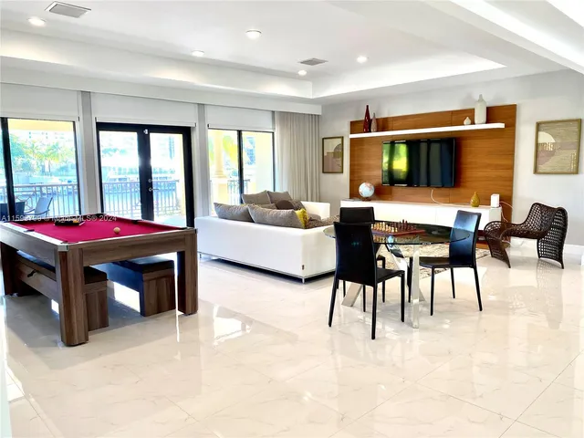 a bedroom with furniture and window