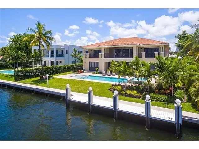 a view of a chairs and tables in the patio