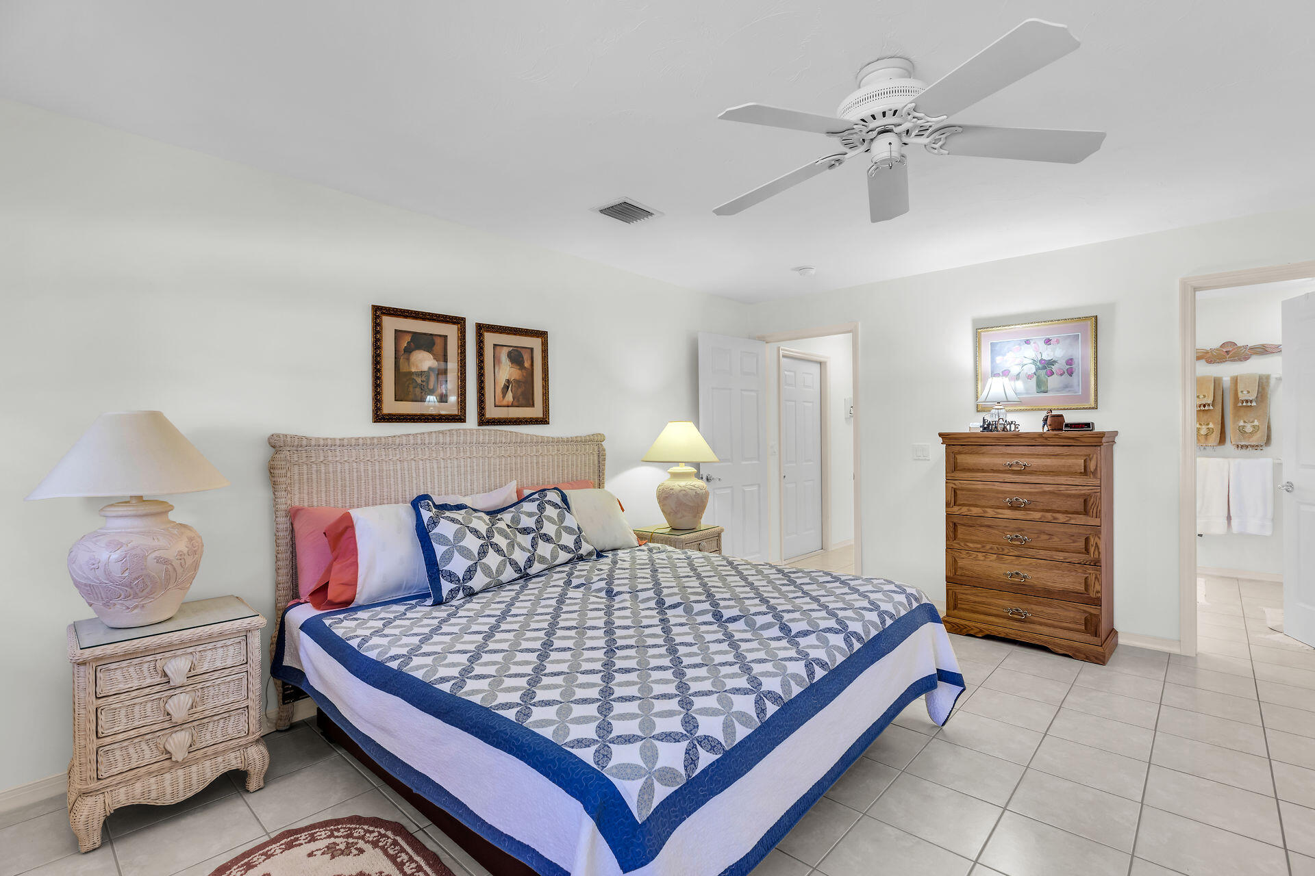 130 9th Street Key Colony Beach, FL 33051 - Photo 16 of 36 a bedroom with a bed and dresser