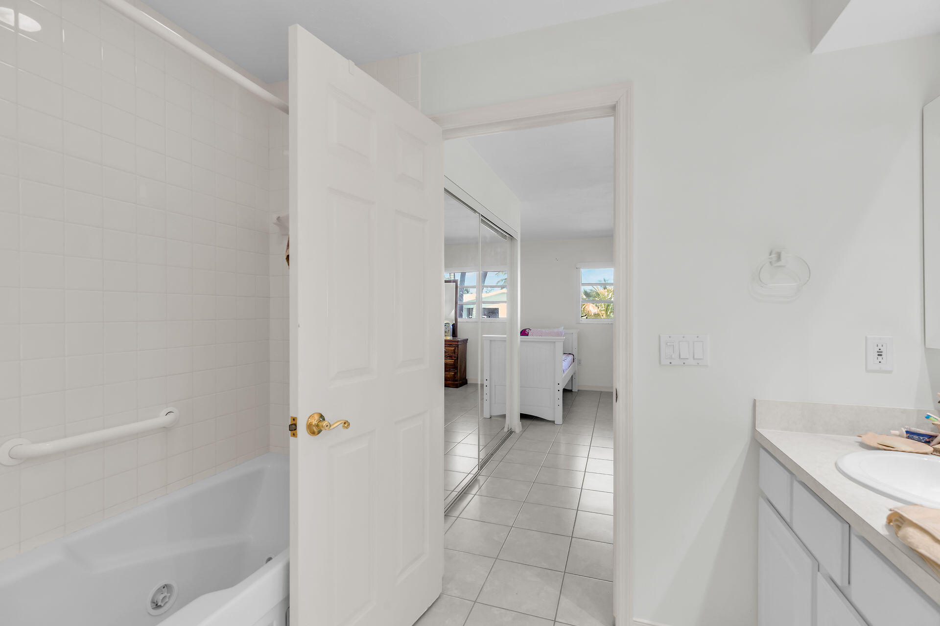 130 9th Street Key Colony Beach, FL 33051 - Photo 19 of 36 a bathroom with a sink and a toilet