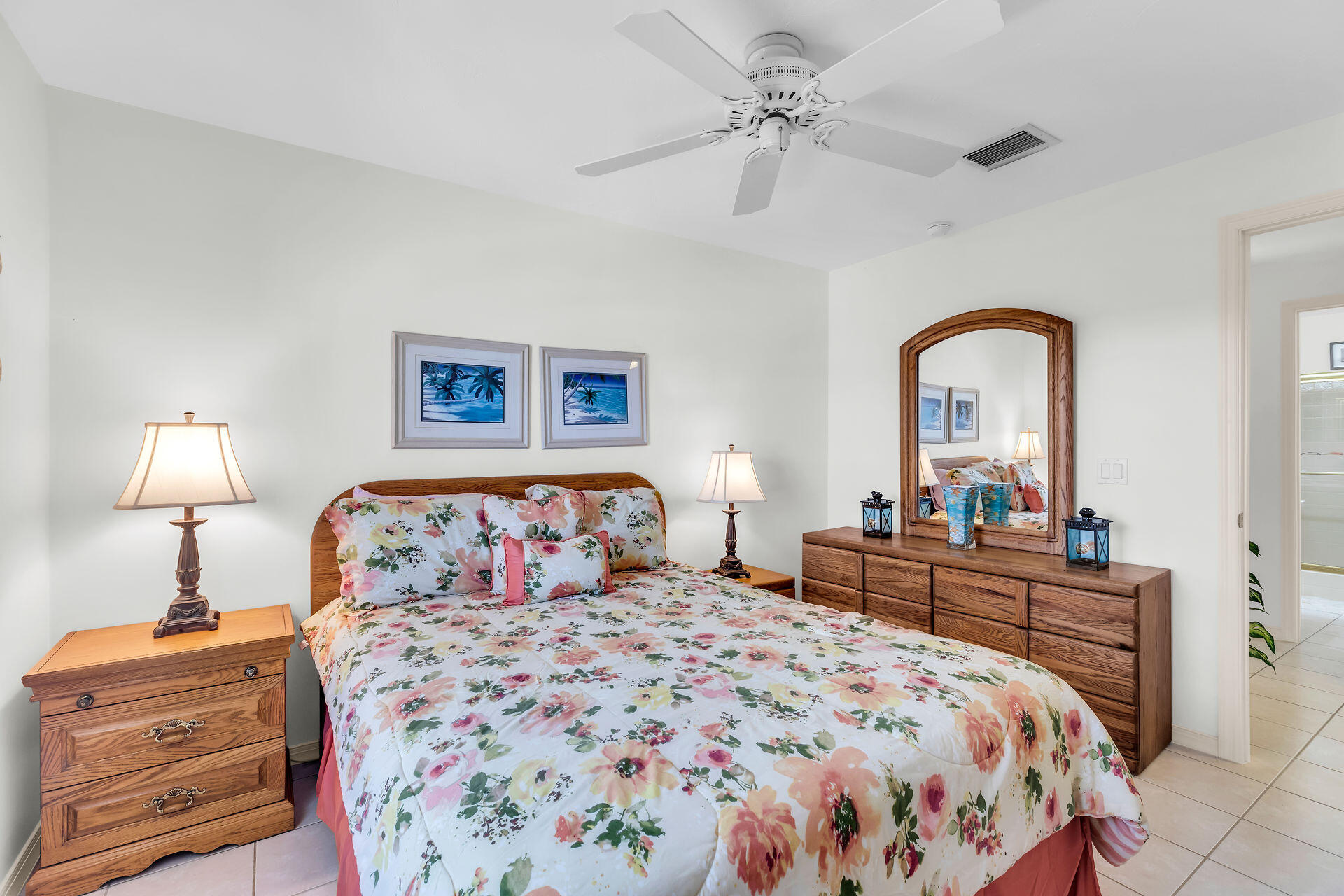 130 9th Street Key Colony Beach, FL 33051 - Photo 21 of 36 a bedroom with a bed and a dresser