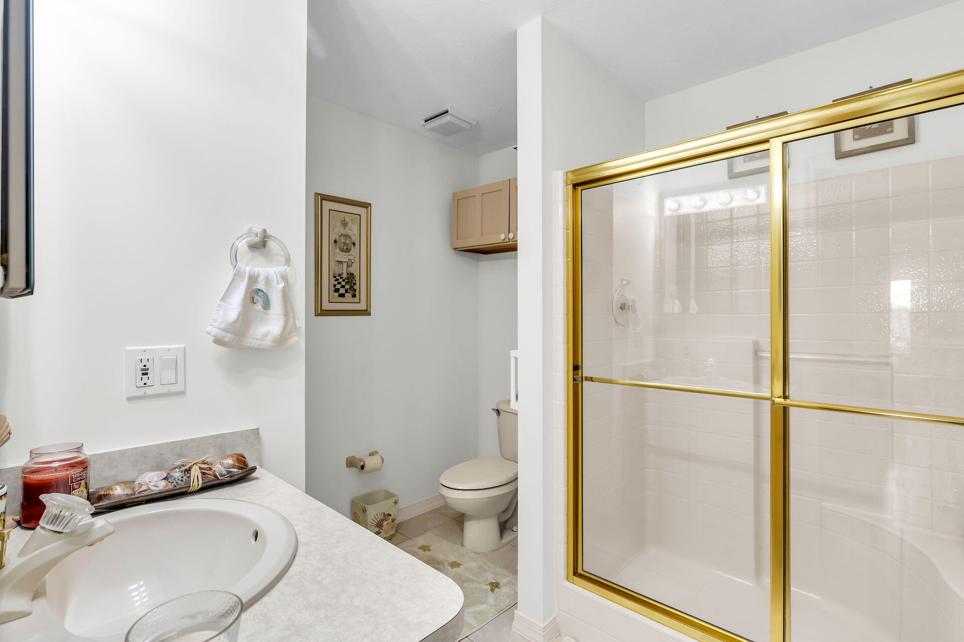 130 9th Street Key Colony Beach, FL 33051 - Photo 23 of 36 a bathroom with a sink toilet and shower