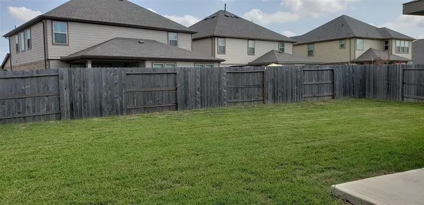 a house view with a garden space
