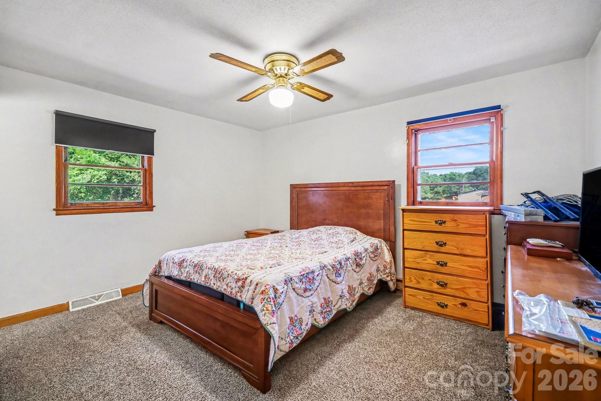 1145 Craigbrow Circle Chester, SC 29706 - Photo 11 of 27 a bedroom with a bed and a dresser