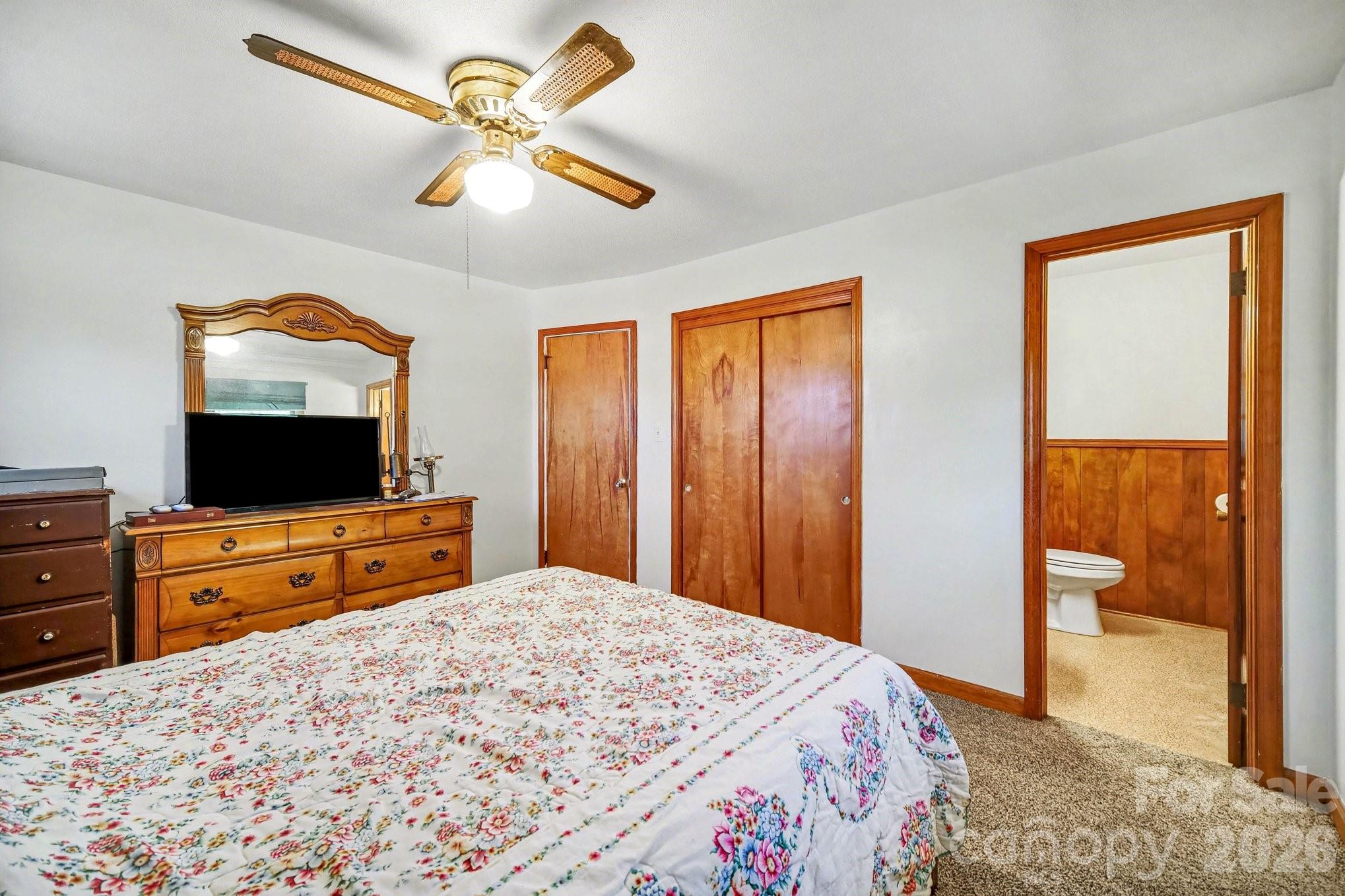 1145 Craigbrow Circle Chester, SC 29706 - Photo 12 of 27 a bedroom with a bed and a flat screen tv