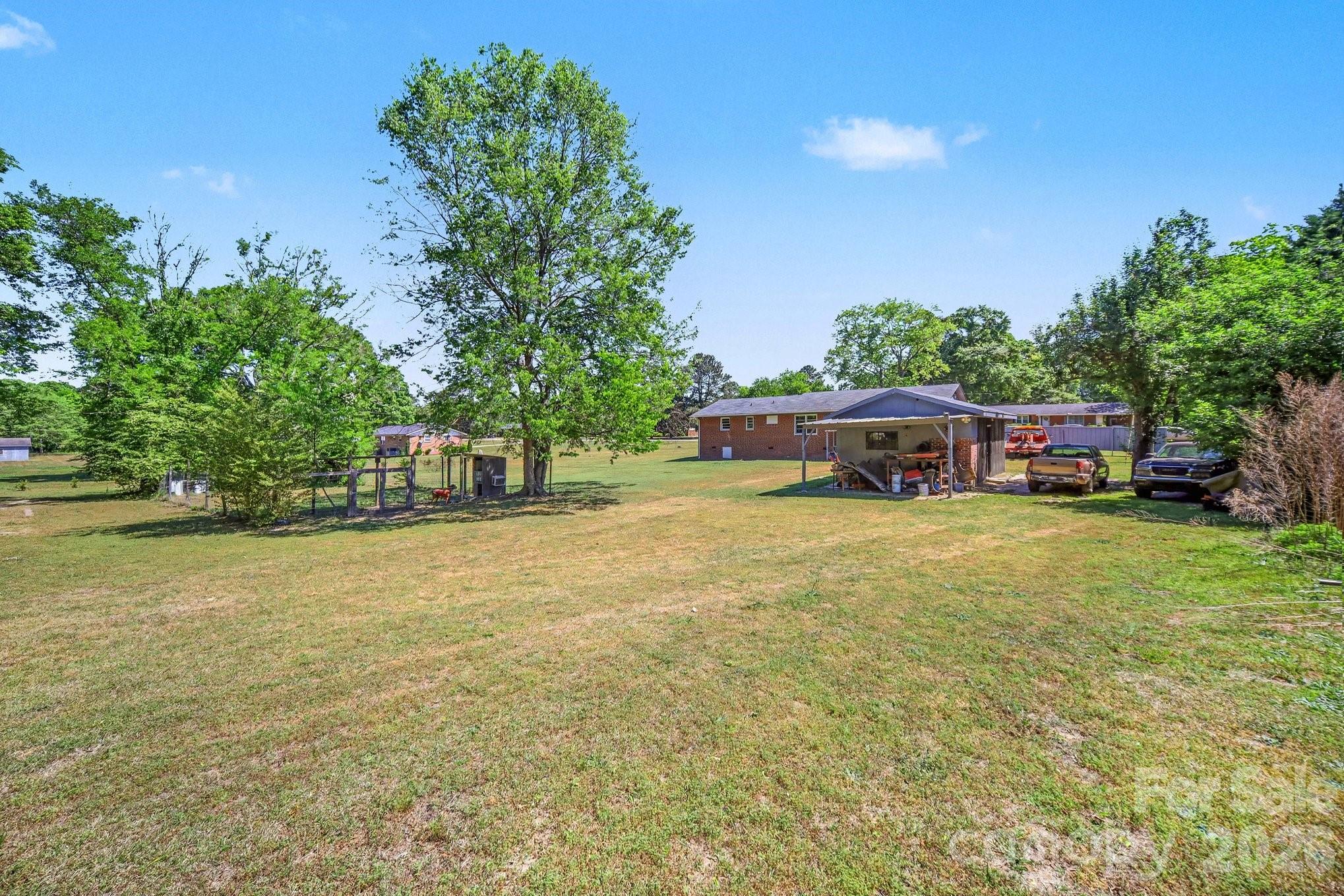 1145 Craigbrow Circle Chester, SC 29706 - Photo 21 of 27 a swimming pool with trees in the background