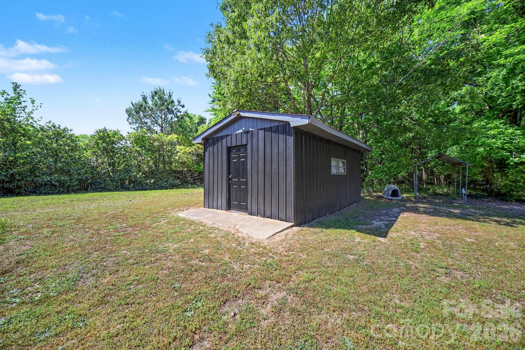 1145 Craigbrow Circle Chester, SC 29706 - Photo 22 of 27 a house with trees in front of it