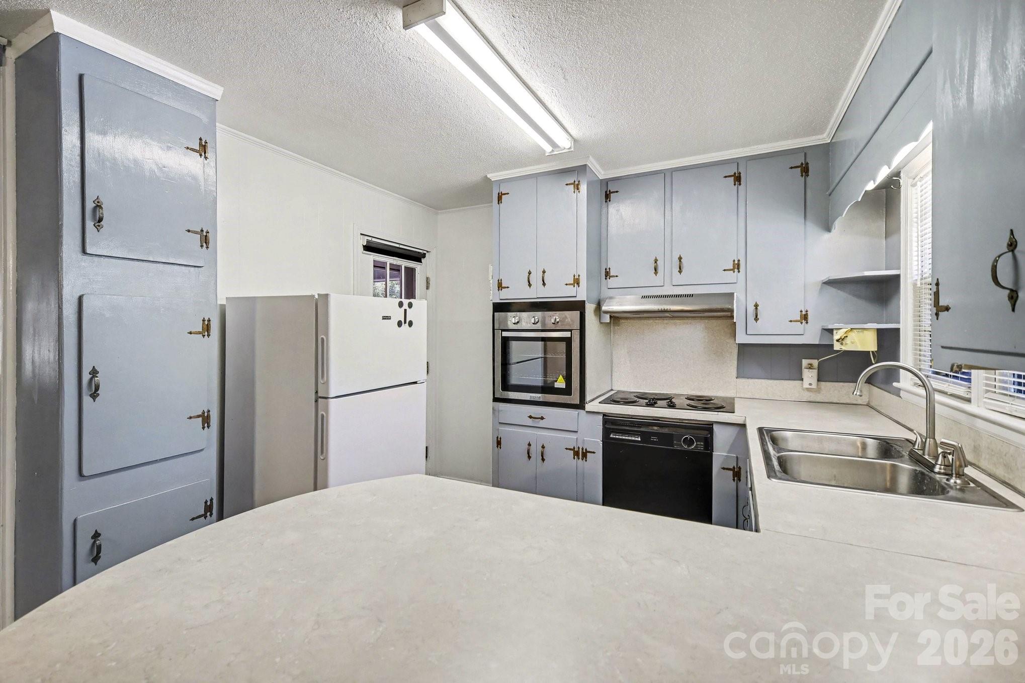 1145 Craigbrow Circle Chester, SC 29706 - Photo 8 of 27 a kitchen with stainless steel appliances granite countertop a refrigerator stove and sink