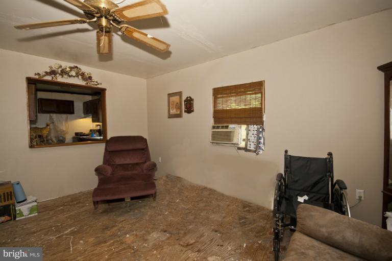 2842 Lodge Farm Road Sparrows Point, MD 21219 - Photo 6 of 8 a living room with furniture