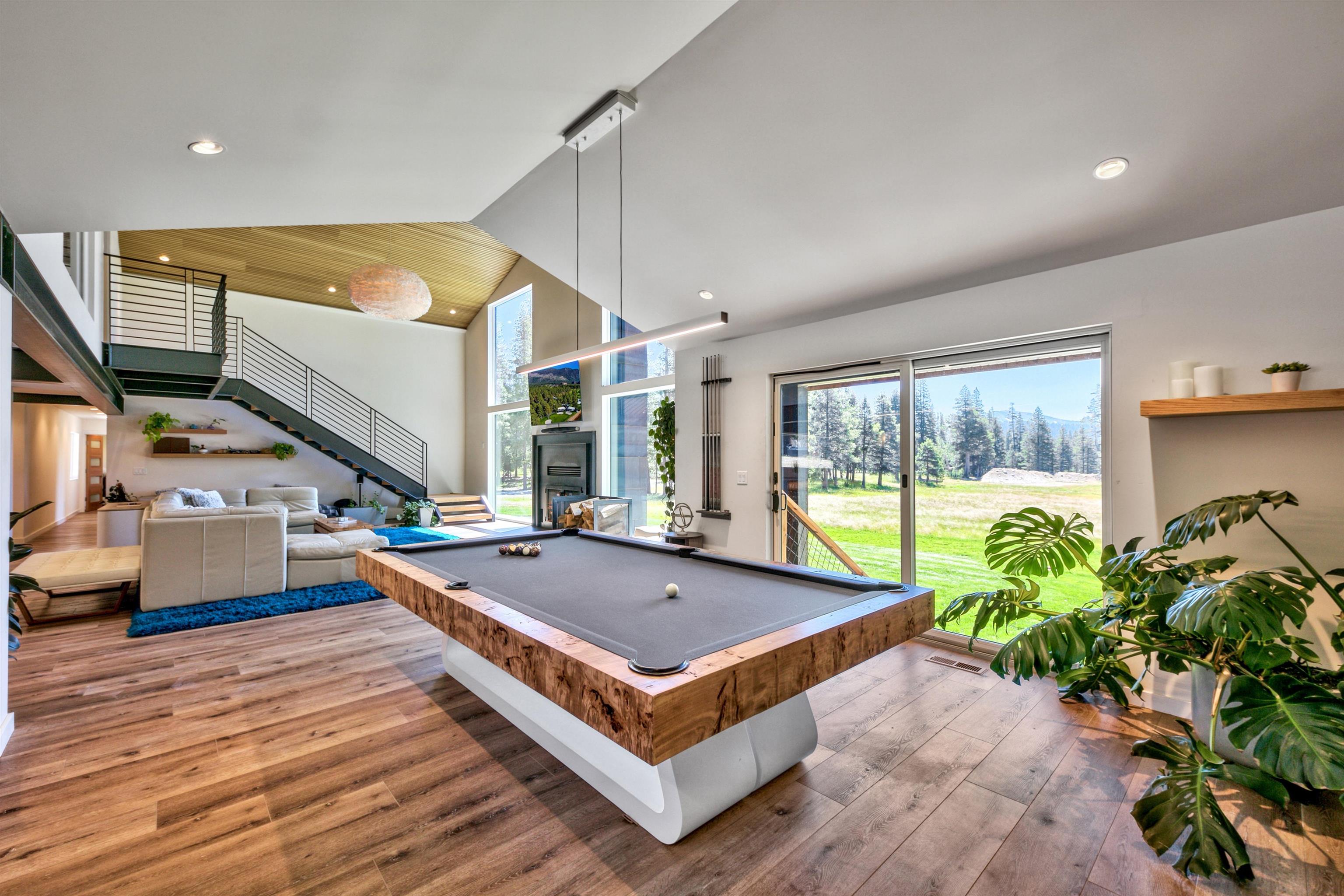 804 Fiberboard Road Sierraville, CA 96126 - Photo 17 of 28 a living room with pool table or couch and a potted plant