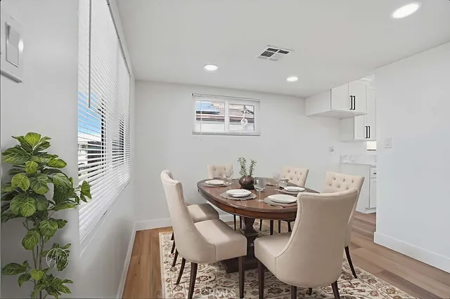 a view of a dining room with furniture