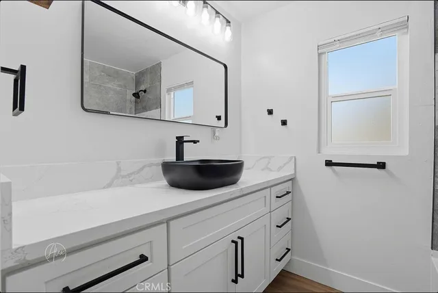 a view of a sink and a mirror