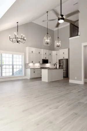 a view of a kitchen with a sink cabinets and window