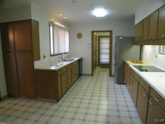 2039 Overhill Road Allentown, PA 18103 - Photo 20 of 26 Doorway from kitchen leads to laundry area and fam