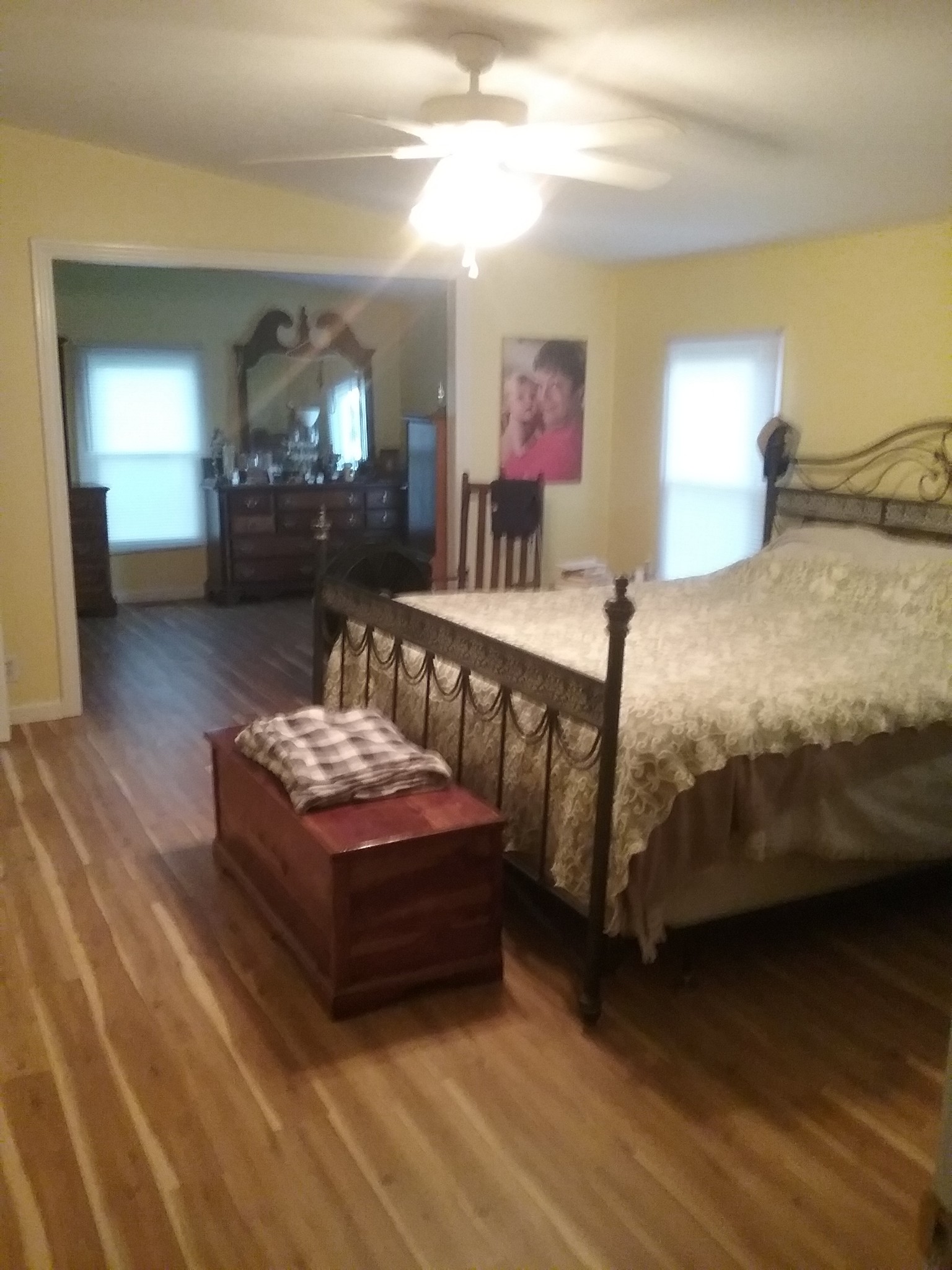 7554 Franklin Road Lebanon, TN 37090 - Photo 13 of 20 a spacious bedroom with a bed and a mirror on dresser