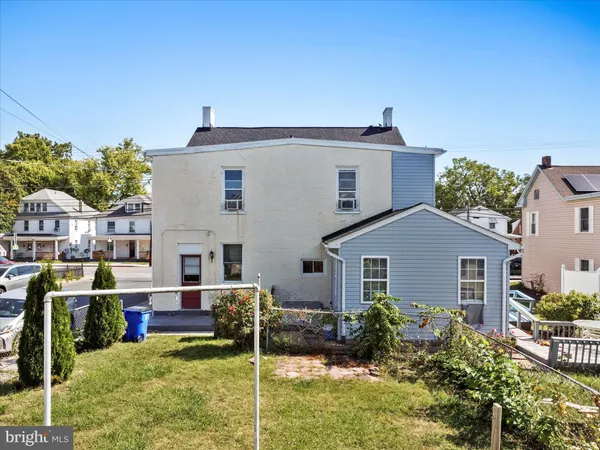 a view of house with outdoor space