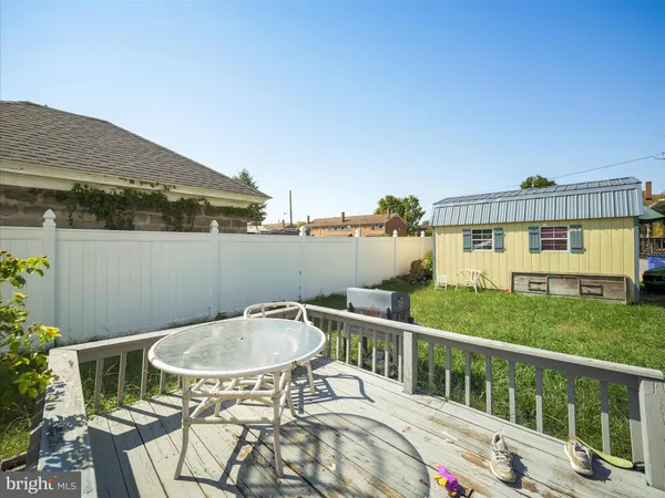 view of balcony with furniture and stove