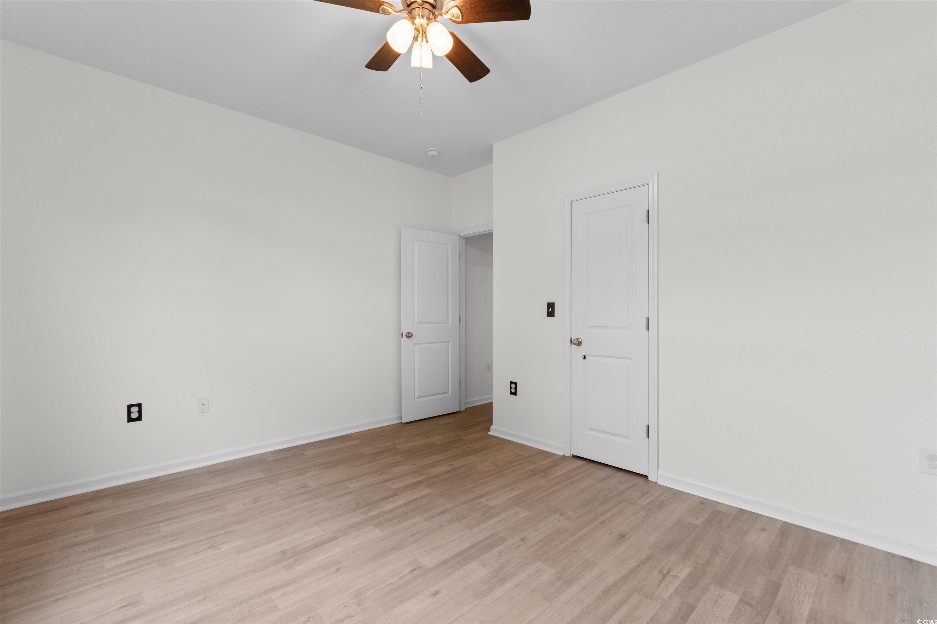 124 Shady Arbor Loop Longs, SC 29568 - Photo 21 of 40 Spare room featuring light wood finished floors and ceiling fan