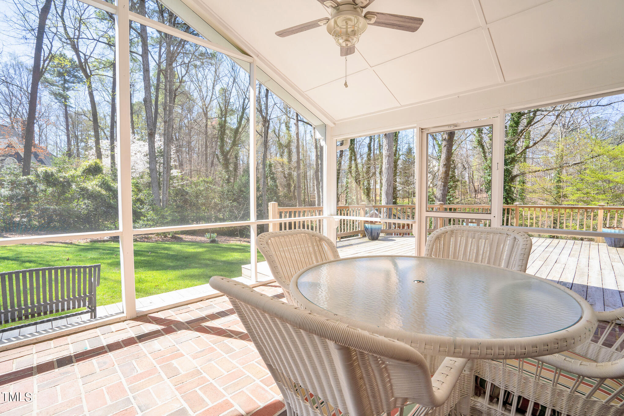 4501 Boxwood Road Raleigh, NC 27612 - Photo 11 of 44 a living room with a large window and a table