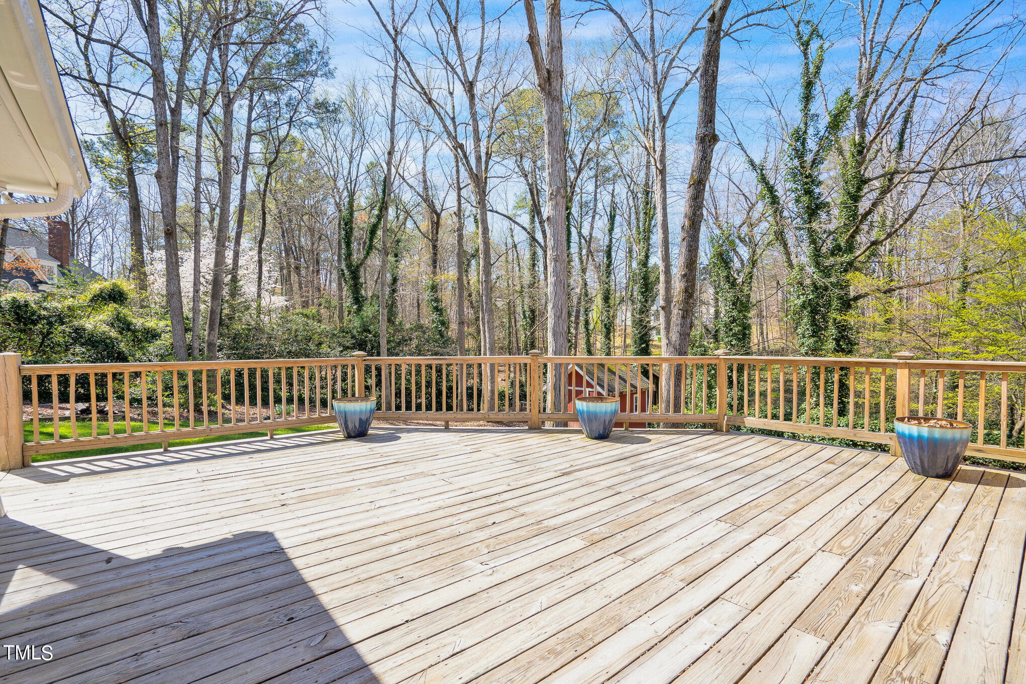 4501 Boxwood Road Raleigh, NC 27612 - Photo 13 of 44 a balcony with wooden floor