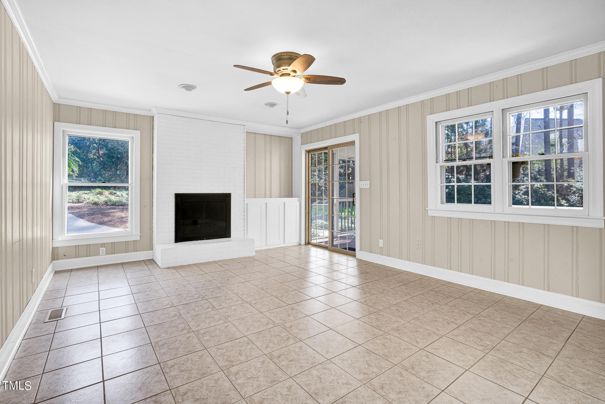 4501 Boxwood Road Raleigh, NC 27612 - Photo 20 of 44 a view of an empty room with a window