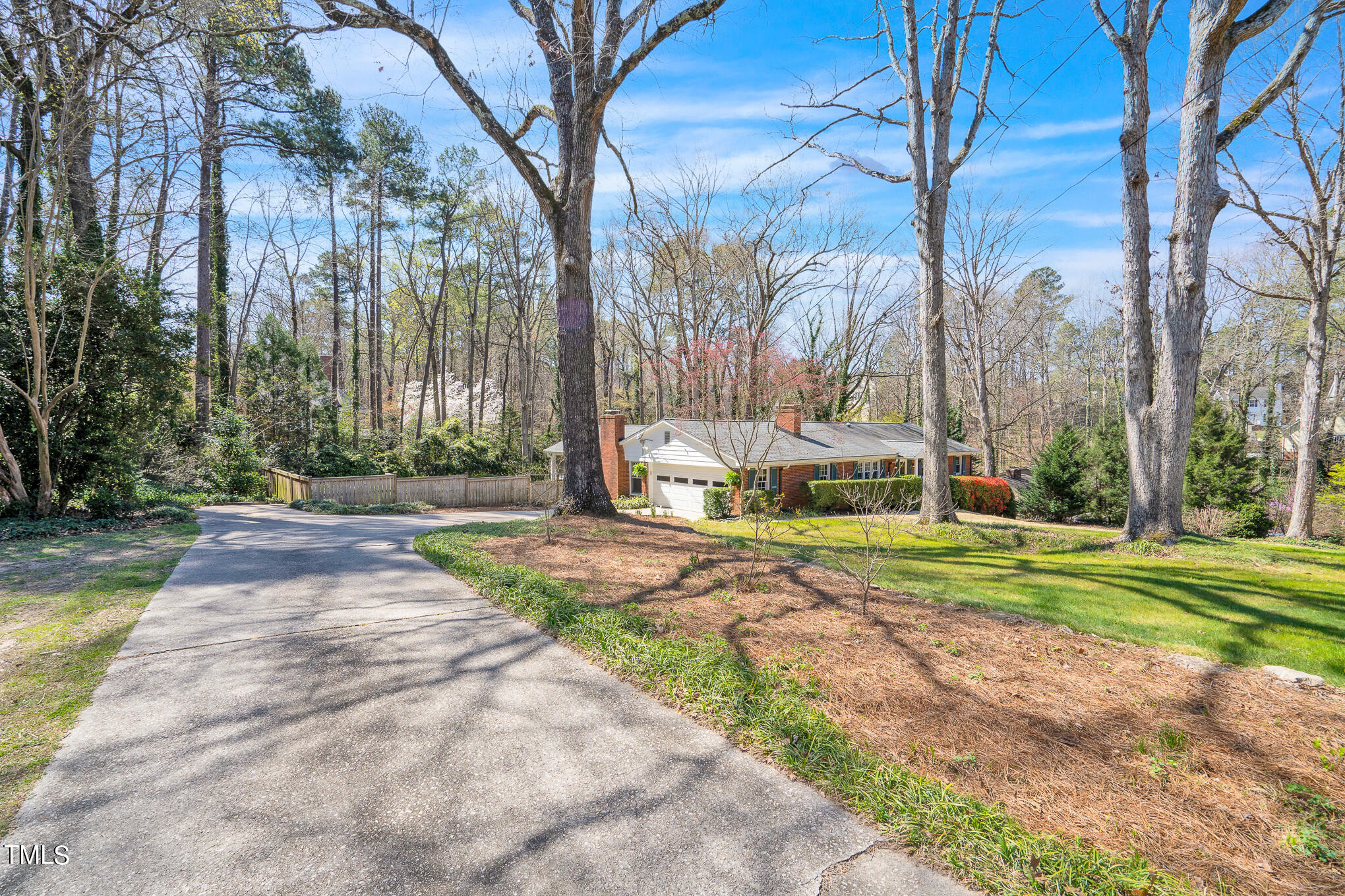 4501 Boxwood Road Raleigh, NC 27612 - Photo 3 of 44 a view of a park with large trees