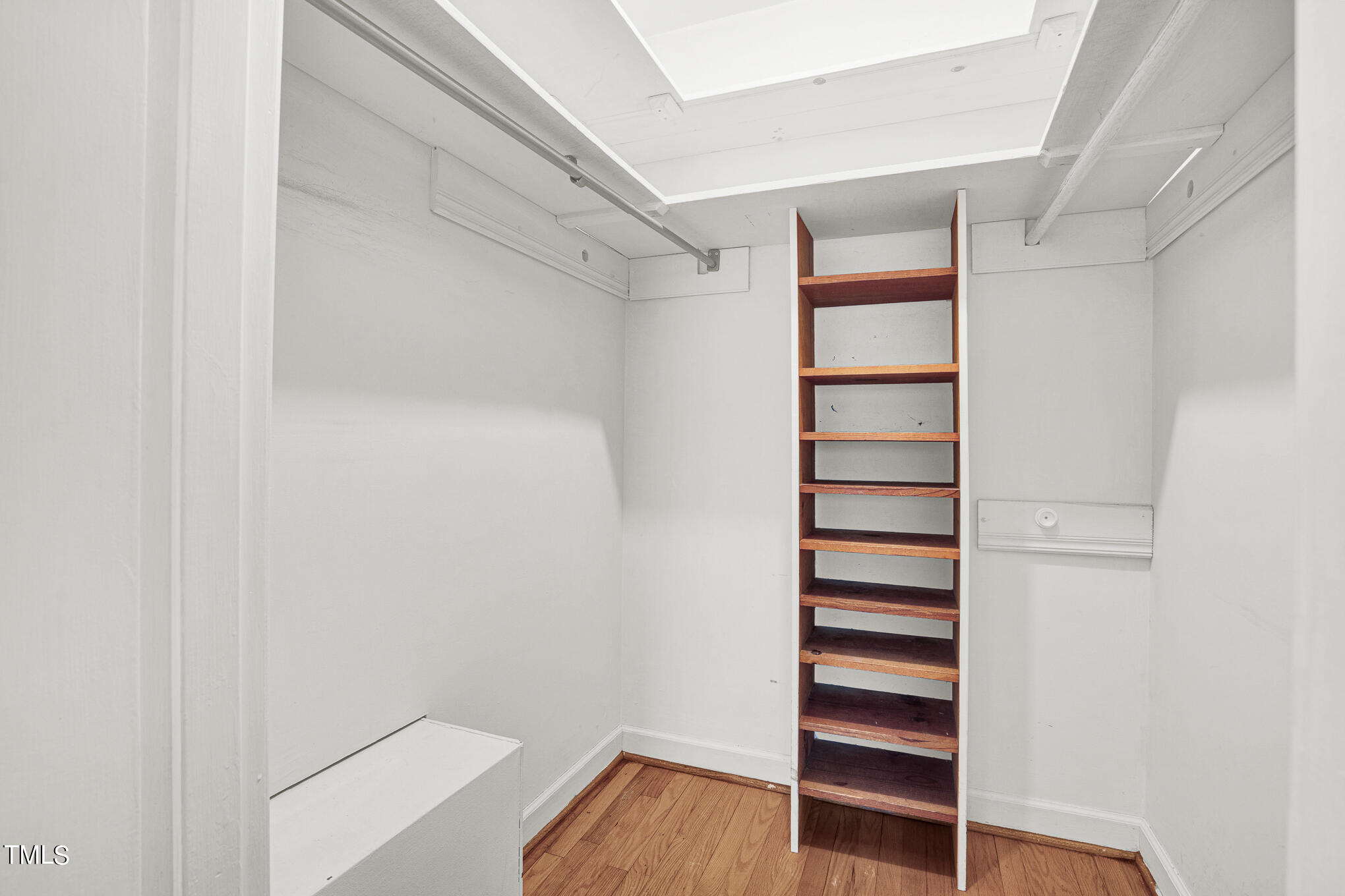 4501 Boxwood Road Raleigh, NC 27612 - Photo 33 of 44 a view of walk in closet with empty racks