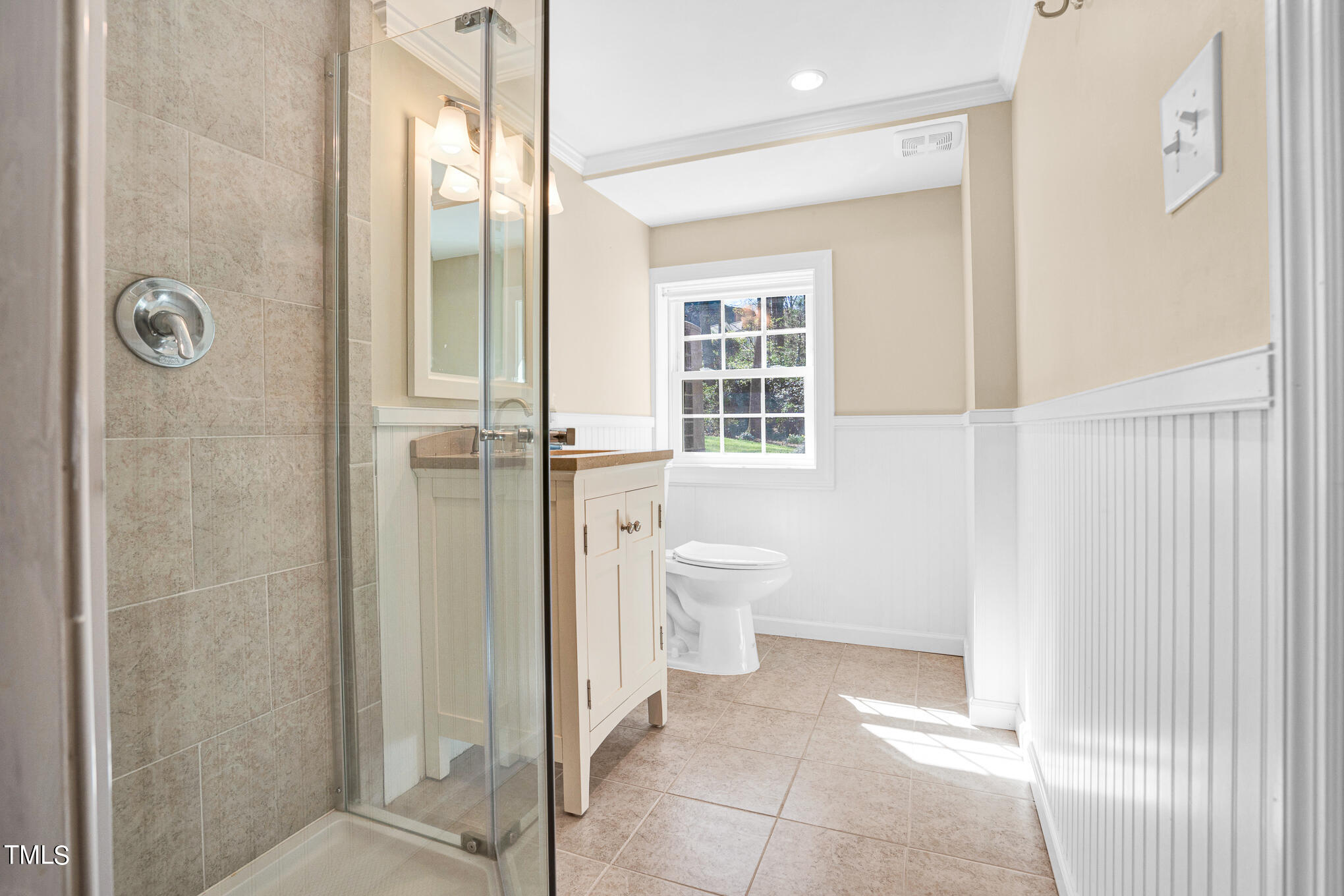 4501 Boxwood Road Raleigh, NC 27612 - Photo 36 of 44 a bathroom with a toilet sink and shower