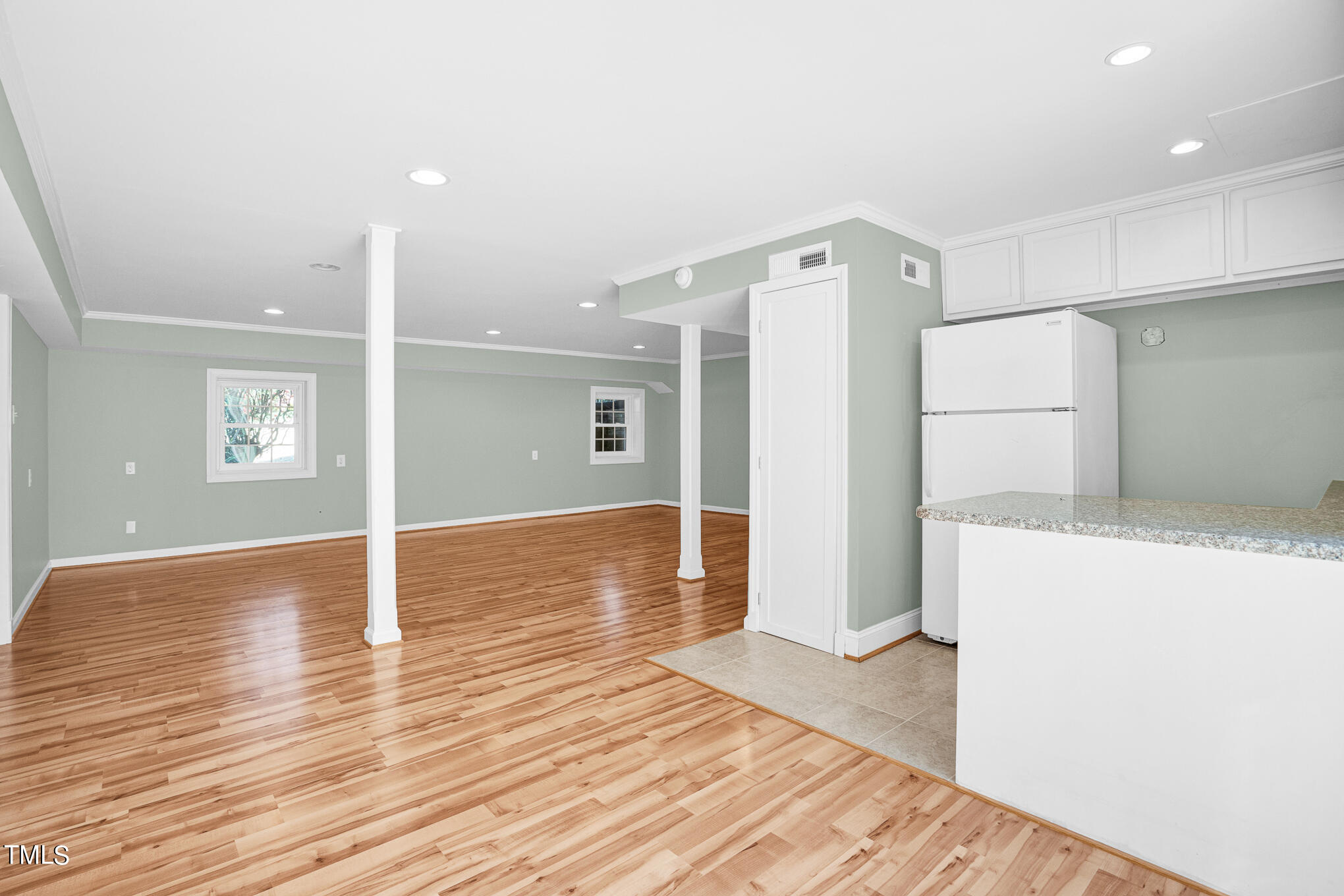 4501 Boxwood Road Raleigh, NC 27612 - Photo 37 of 44 a view of empty room with wooden floor