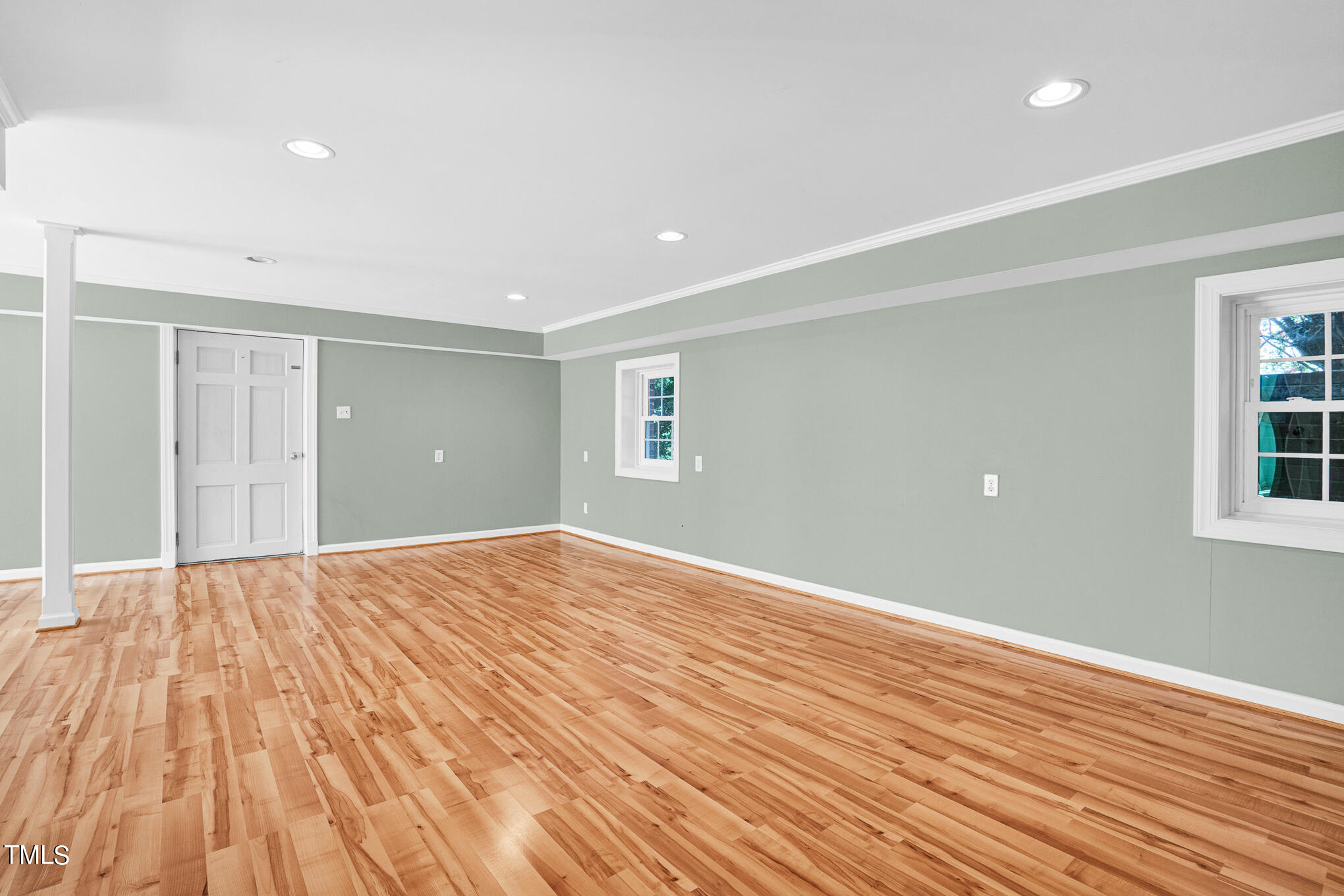 4501 Boxwood Road Raleigh, NC 27612 - Photo 41 of 44 a view of empty room with wooden floor