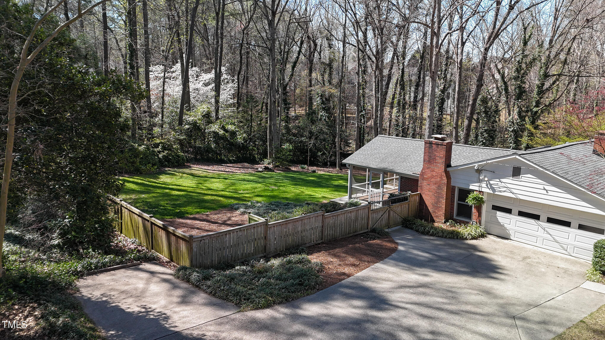 4501 Boxwood Road Raleigh, NC 27612 - Photo 5 of 44 a garden view with a seating space