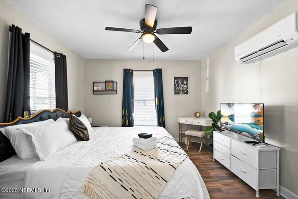 a kitchen with stainless steel appliances a stove microwave and refrigerator