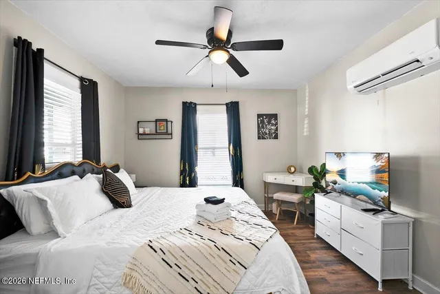 a kitchen with stainless steel appliances a stove microwave and refrigerator