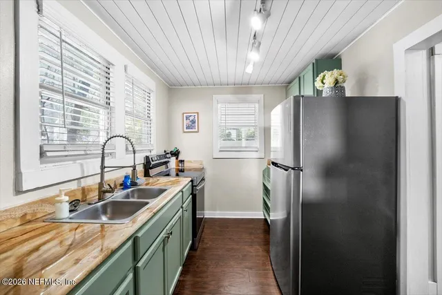 a view of a dining room with furniture