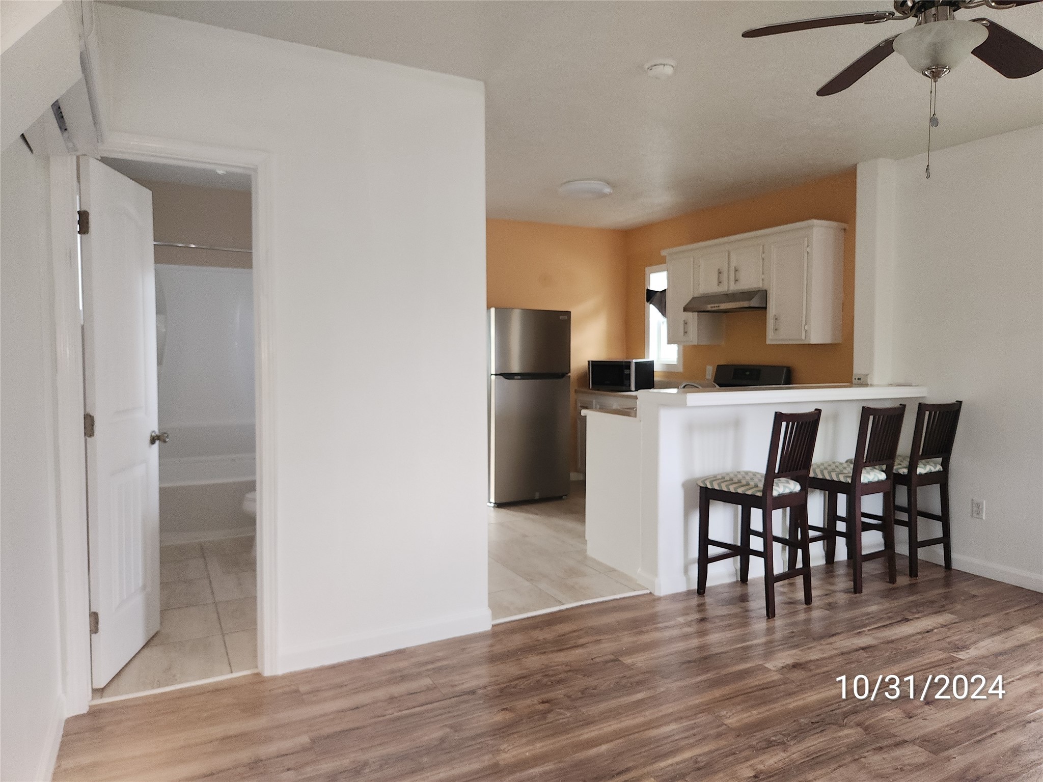 703 North Avenue B Freeport, TX 77541 - Photo 4 of 14 a view of a kitchen and dining room