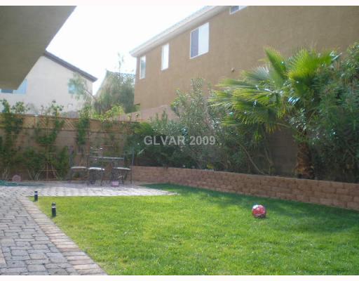 255 Soggy Ruff Way Las Vegas, NV 89148 - Photo 10 of 12 Property Photo. lush backyard with nice size patio - great for intertaining