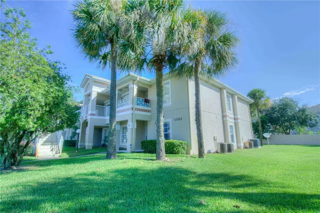 front view of a house with a garden
