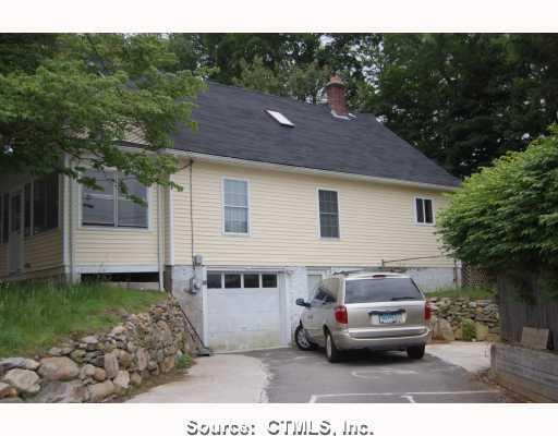 7 Lucas Park Road Norwich, CT 06360 - Photo 1 of 1 a view of house with backyard outdoor seating and green space