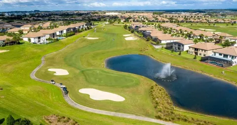 a view of swimming pool with a yard