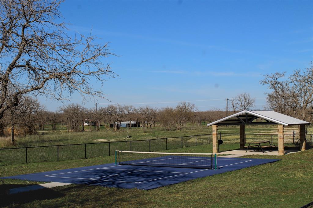 1070 Paradise Oaks Perrin, TX 76486 - Photo 16 of 18 a view of a house with a big yard