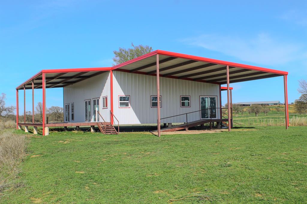 1070 Paradise Oaks Perrin, TX 76486 - Photo 3 of 18 a view of a house with backyard