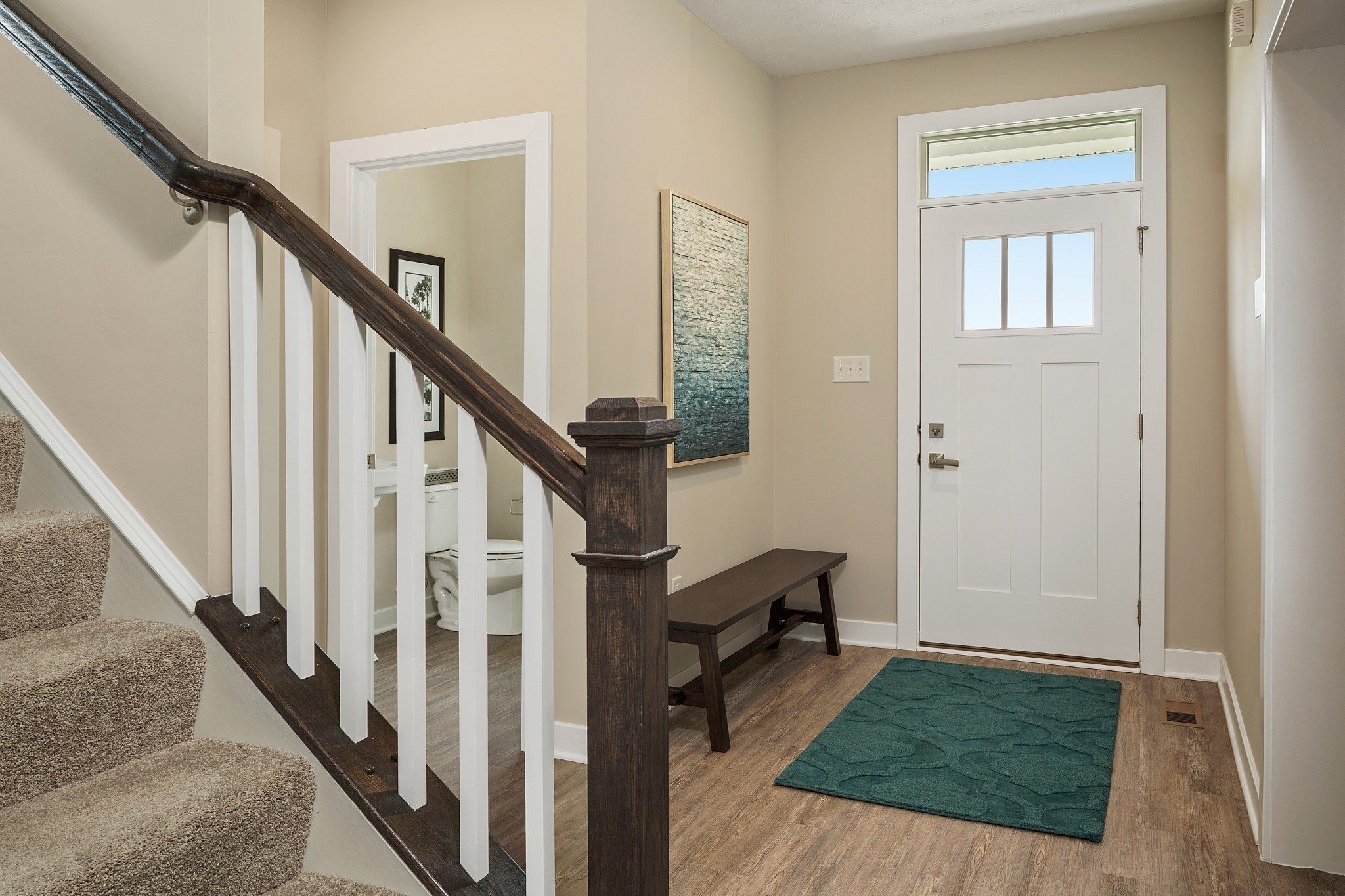 304 Collier Road Mount Juliet, TN 37122 - Photo 7 of 9 a view of staircase with white walls and a rug