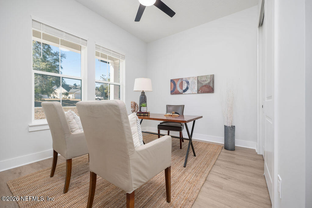2747 Anchor Road Middleburg, FL 32068 - Photo 12 of 26 a view of a dining room with furniture window and outside view