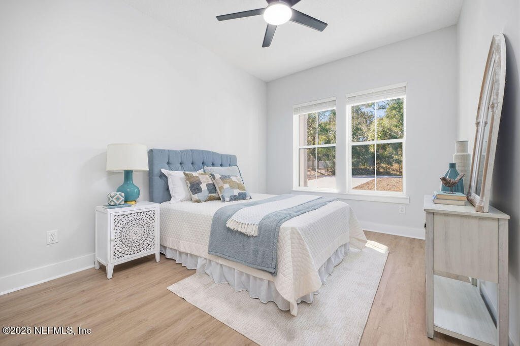 2747 Anchor Road Middleburg, FL 32068 - Photo 18 of 26 a bedroom with a bed and a window
