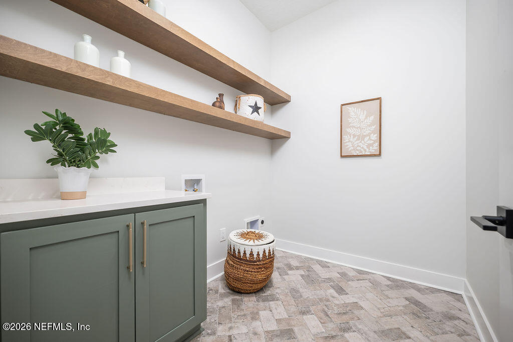 2747 Anchor Road Middleburg, FL 32068 - Photo 21 of 26 a bathroom with a sink and a mirror
