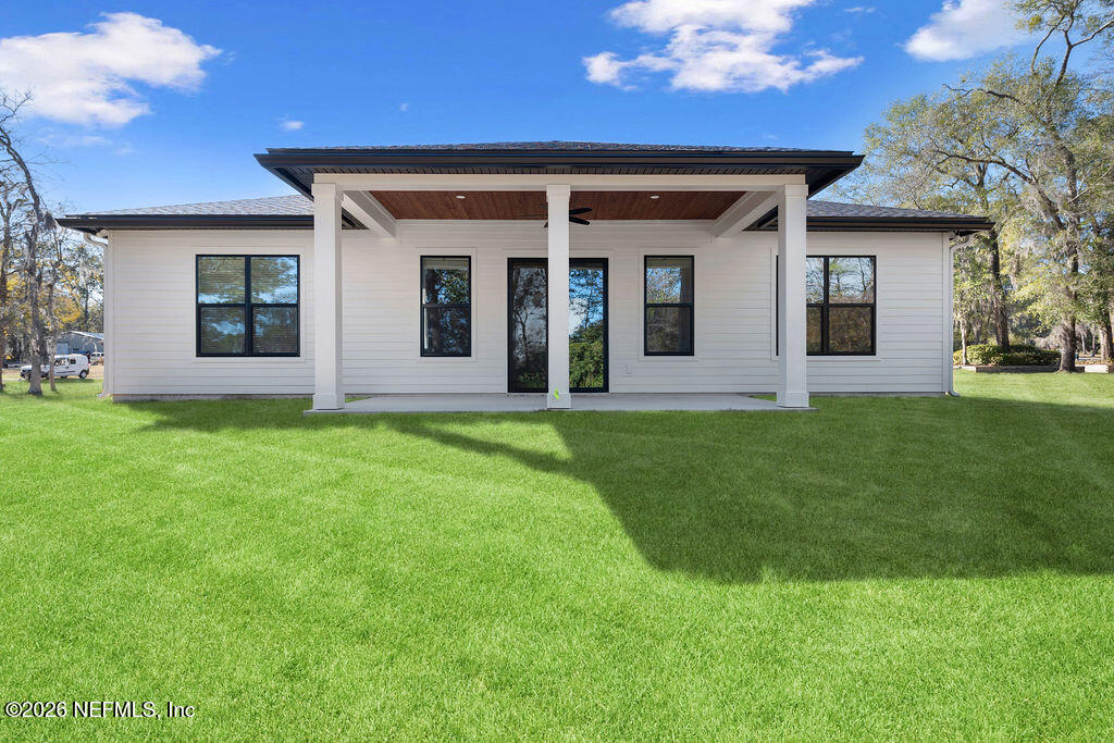 2747 Anchor Road Middleburg, FL 32068 - Photo 26 of 26 a view of a house with a yard