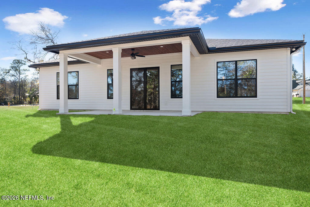 2747 Anchor Road Middleburg, FL 32068 - Photo 4 of 26 a front view of house with yard and green space