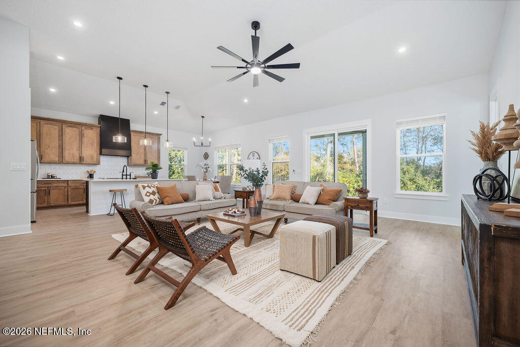 2747 Anchor Road Middleburg, FL 32068 - Photo 7 of 26 a living room with furniture and a large window