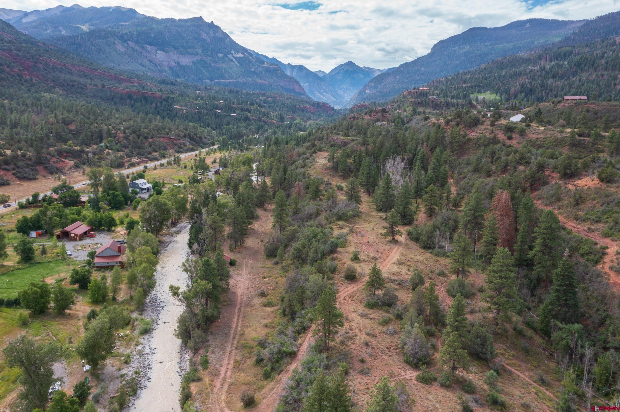 23 County Road 23 Ridgway, CO 81432 - Photo 9 of 9 a view of a lush green hillside and houses