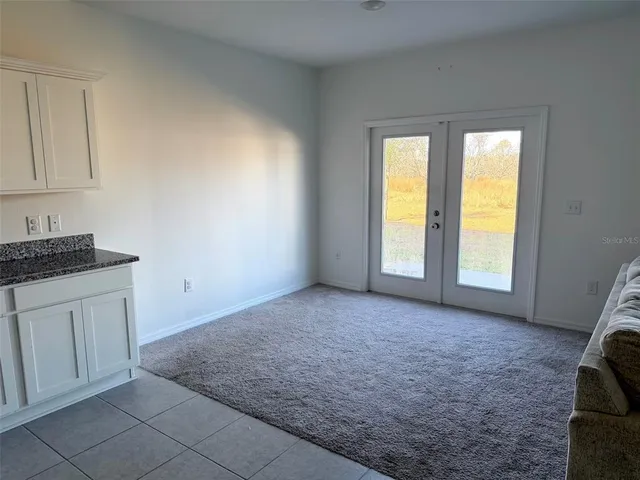 a big room with windows and closet